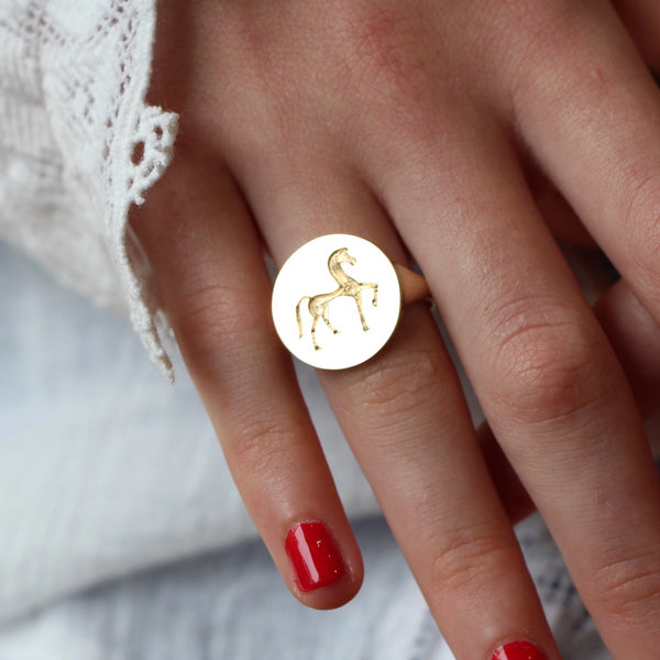 Gold signet ring with greek horse hand engraved by Tamahra Prowse
