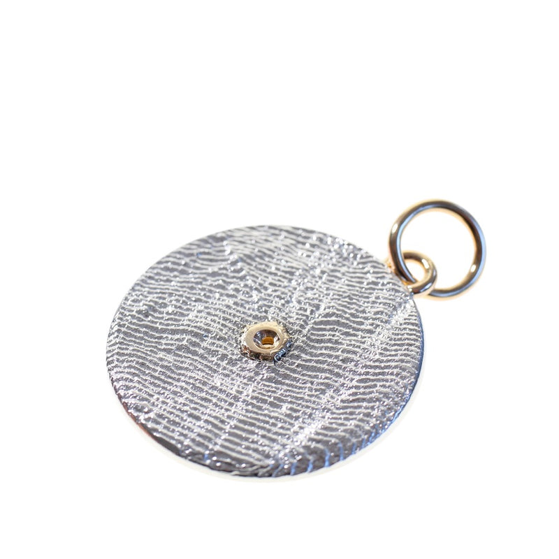 Diamond disc textured pendant