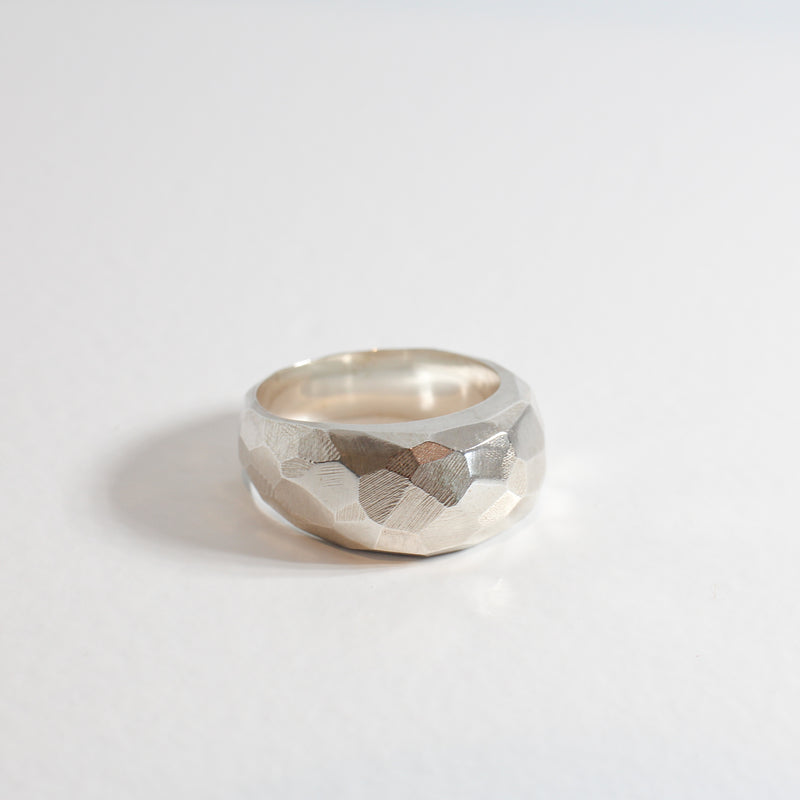 Faceted bomb ring