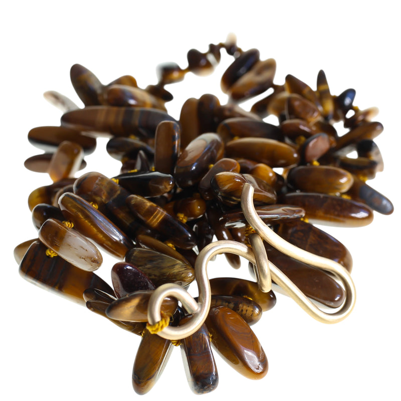 Large gold hook with a tiger eye beaded necklace