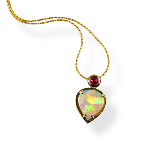 Australian crystal opal pendant set in 18 karat yellow gold with a bright pink rubellite