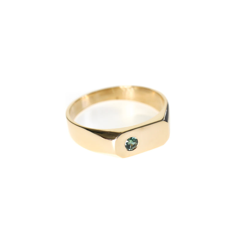 Blue green australian parti sapphire set in a unisez signet ring 9kt yellow gold