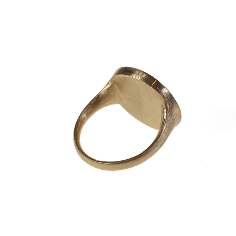 Round faced rustic unisex signet ring in 9kt yellow gold