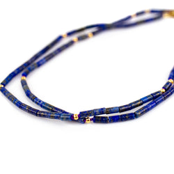 Fine lapis lazuli necklace with solid gold accents. Beaded on silk thread. Stacking necklace