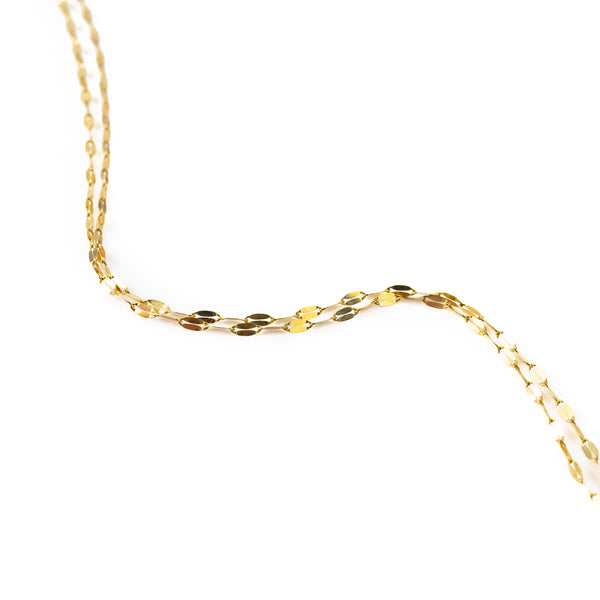 Solid gold fancy chain in 9 karat yellow gold by Tamahra Prowse.