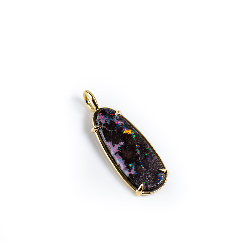 Boulder opal pendant in 18 karat yellow gold. Opal mined in Winton Queensland Australia. Designed by jeweller Tamahra Prowse.