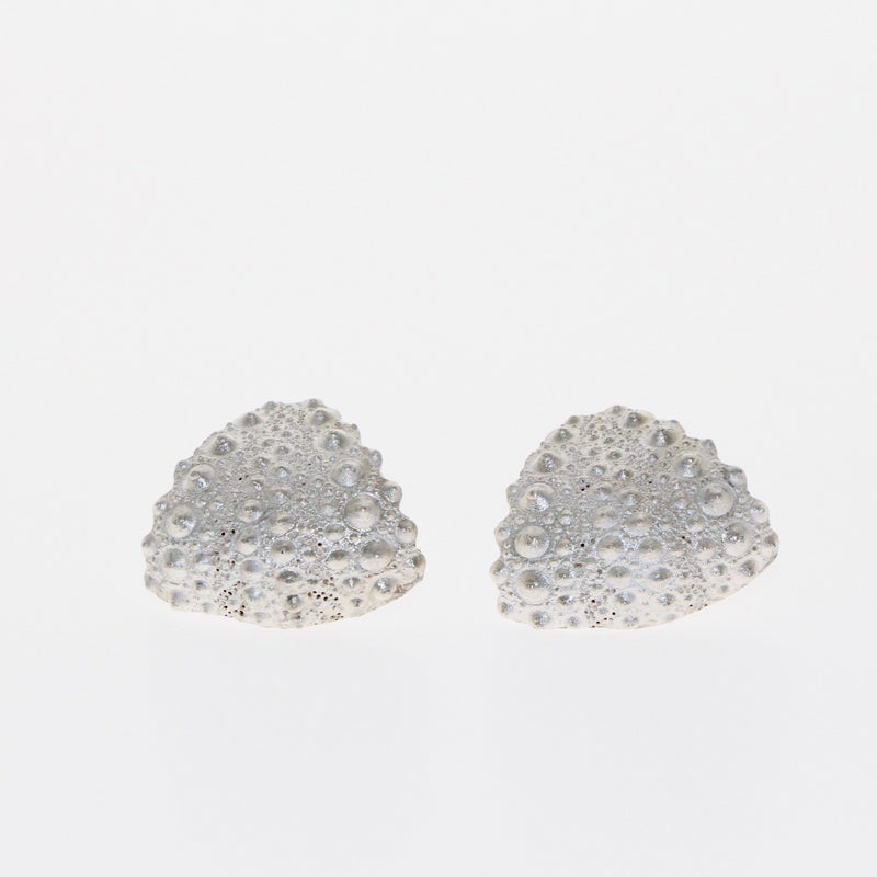 Silver and gold Fragment earrings by designer Tamahra Prowse.