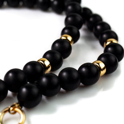 8mm matt black onyx beaded necklace with solid gold accents by jewellery designer Tamahra Prowse. 