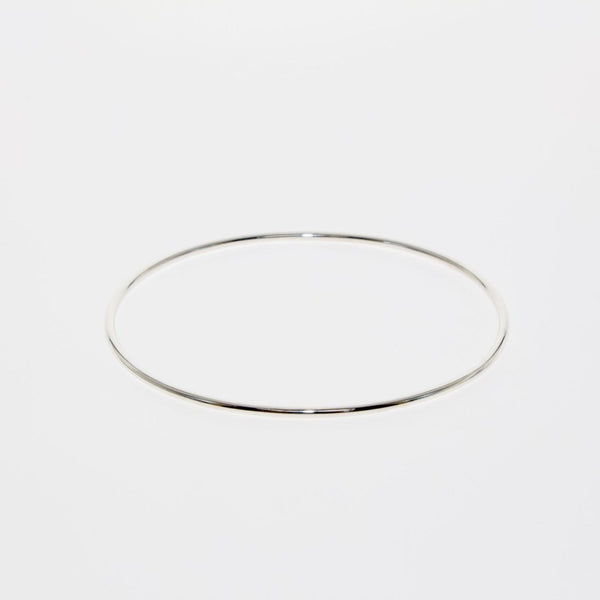 Simple Geometry series oval bangle in silver by Tamahra Prowse.