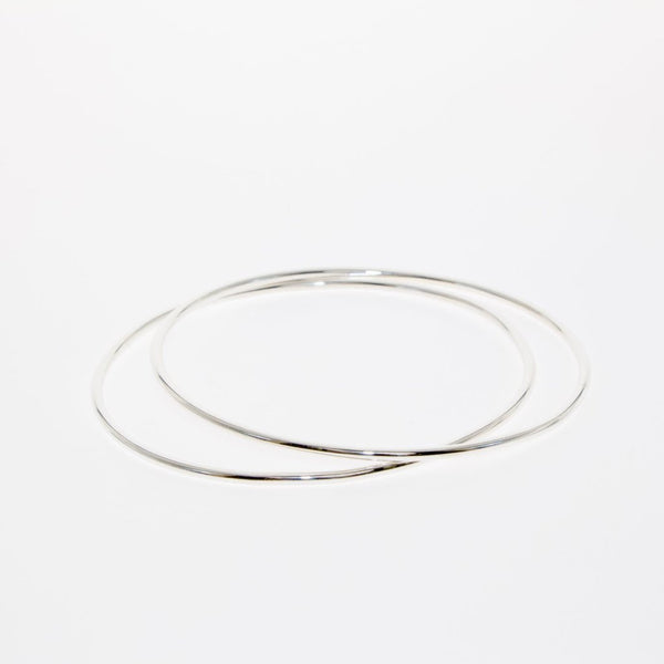 Simple Geometry series oval bangle in silver by Tamahra Prowse.