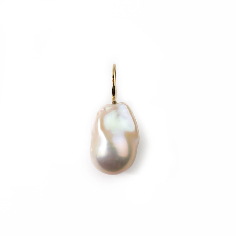 Simple baroque pearl pendant with large gold loop  by Tamahra Prowse.