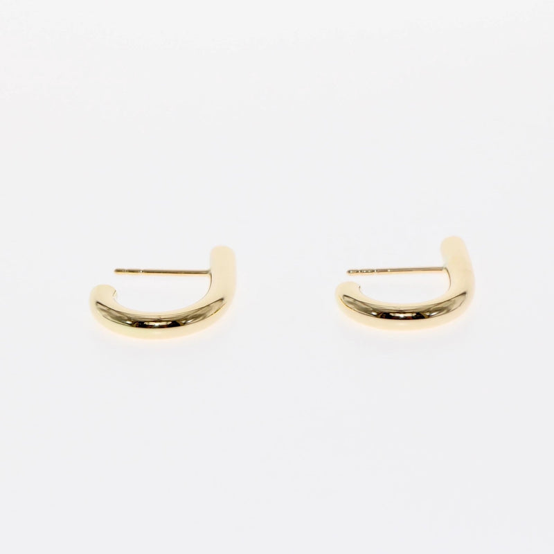 J earrings by Tamahra Prowse. Gold with a punk edge.