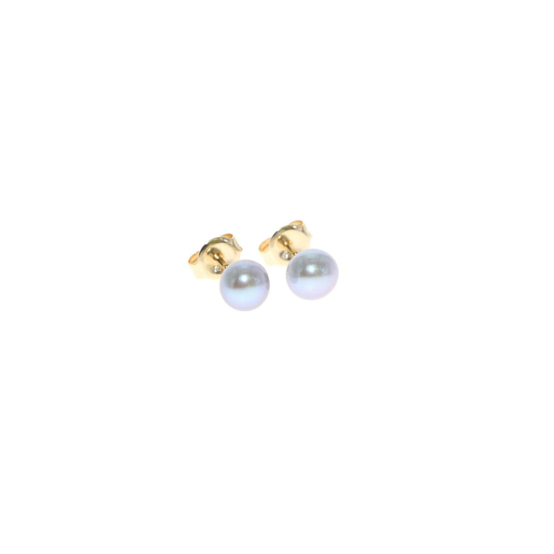 Tiny pearl earrings in 9kt gold by Tamahra Prowse Jewellery Design