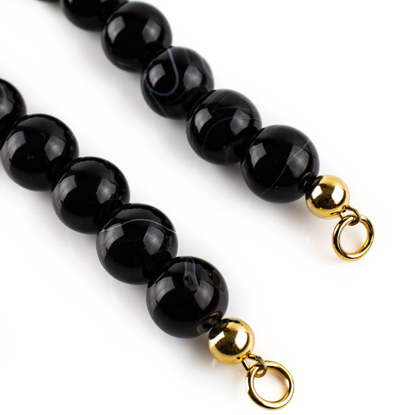 Black and white agate choker necklace with solid gold accents by jeweller Tamahra Prowse.